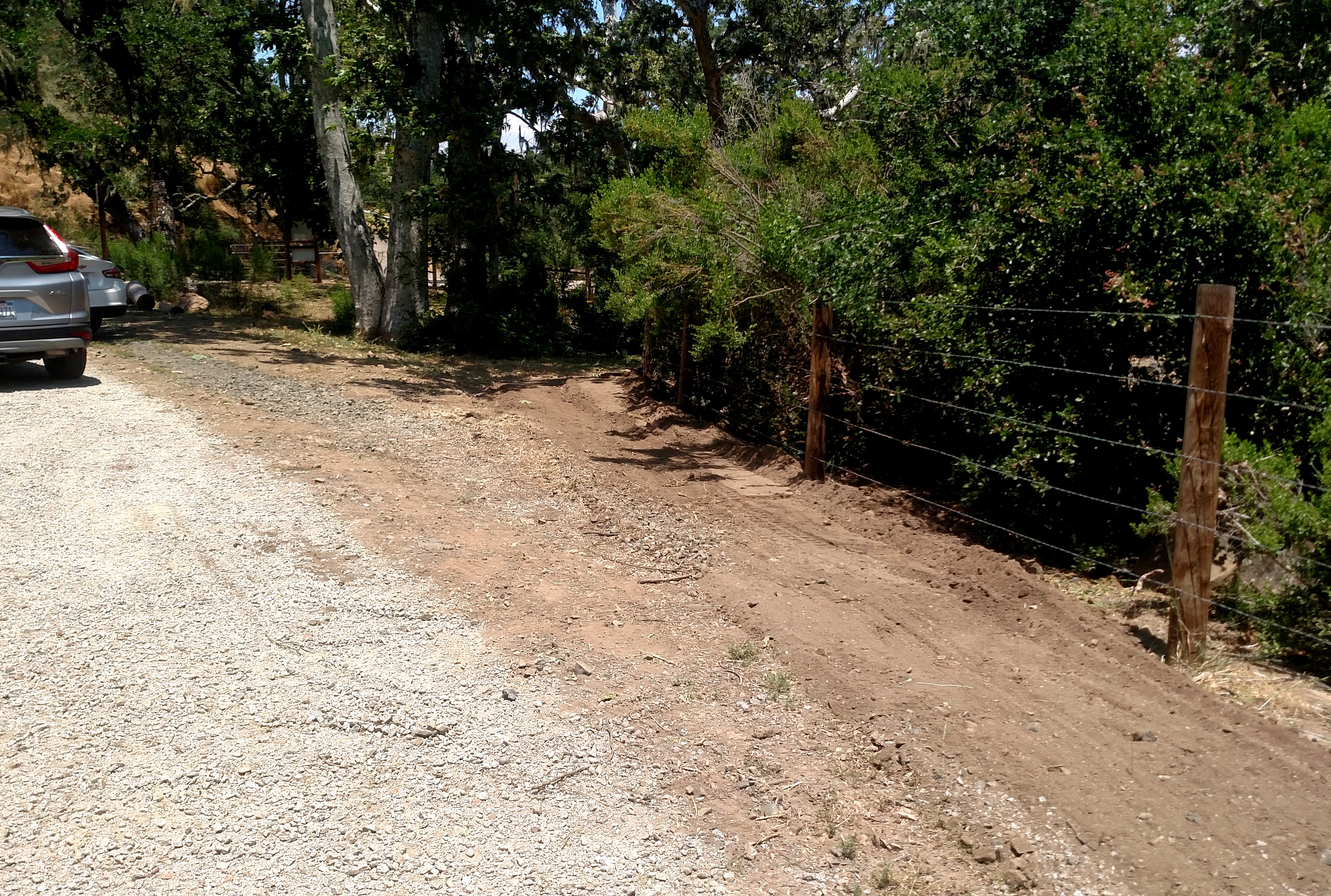 Erosion along the fence line is filled in.